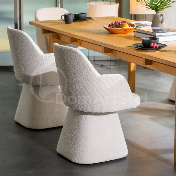 White boucle dining chairs by Caprice Mils