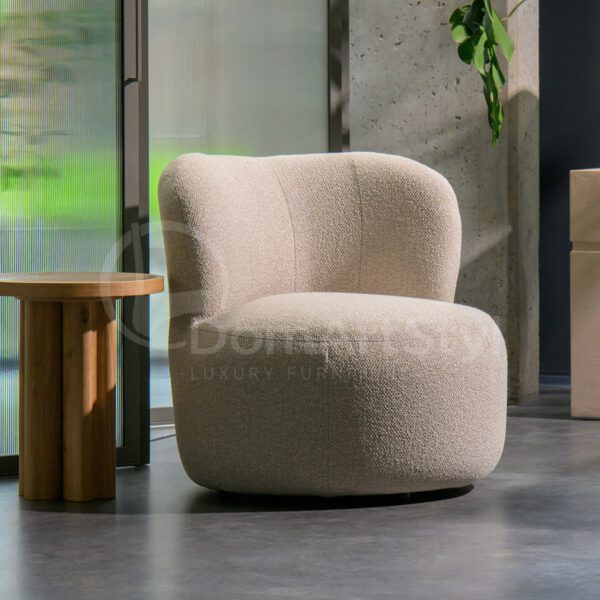 Small beige Kleo bedroom armchair