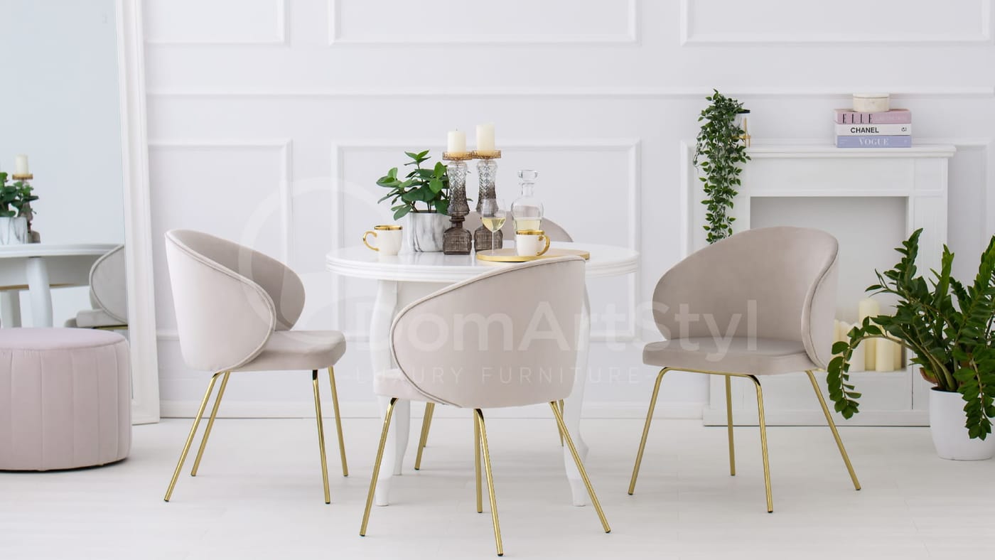 Modern dining room design with cream upholstered chairs