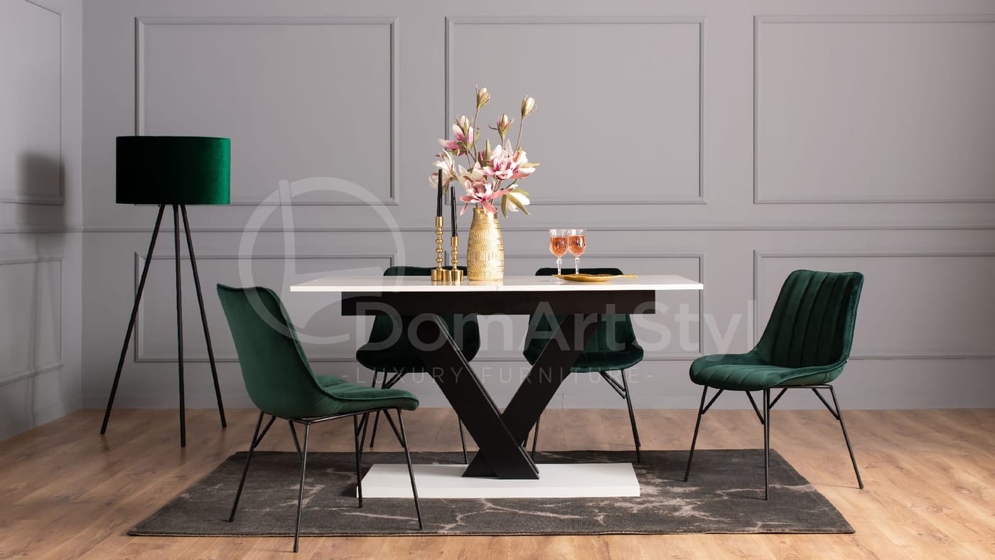 Green velour dining chairs on black legs by Rango Spider