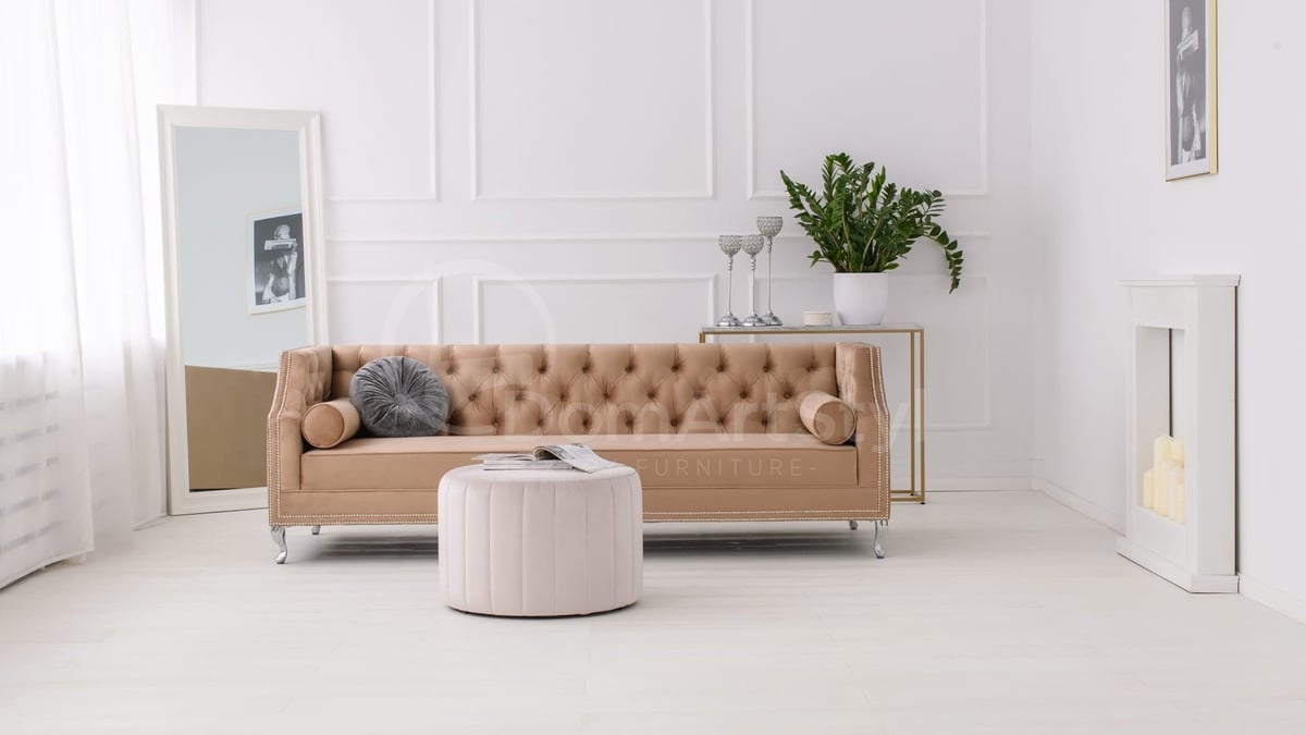 Elegant three-seater sofa in chesterfield style